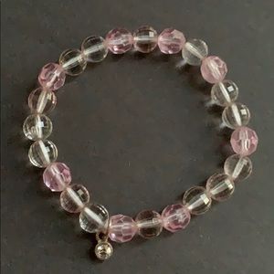 clear/pink charm bracelet